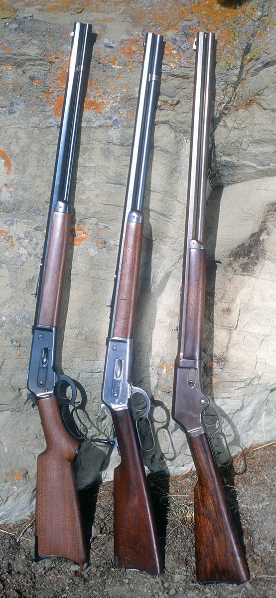Black-powder, big-bore rifles are (left to right): a modern Winchester Model 1886 .45-70, original Winchester 1886 .45-90 and an original Marlin Model 1881 .45-70.